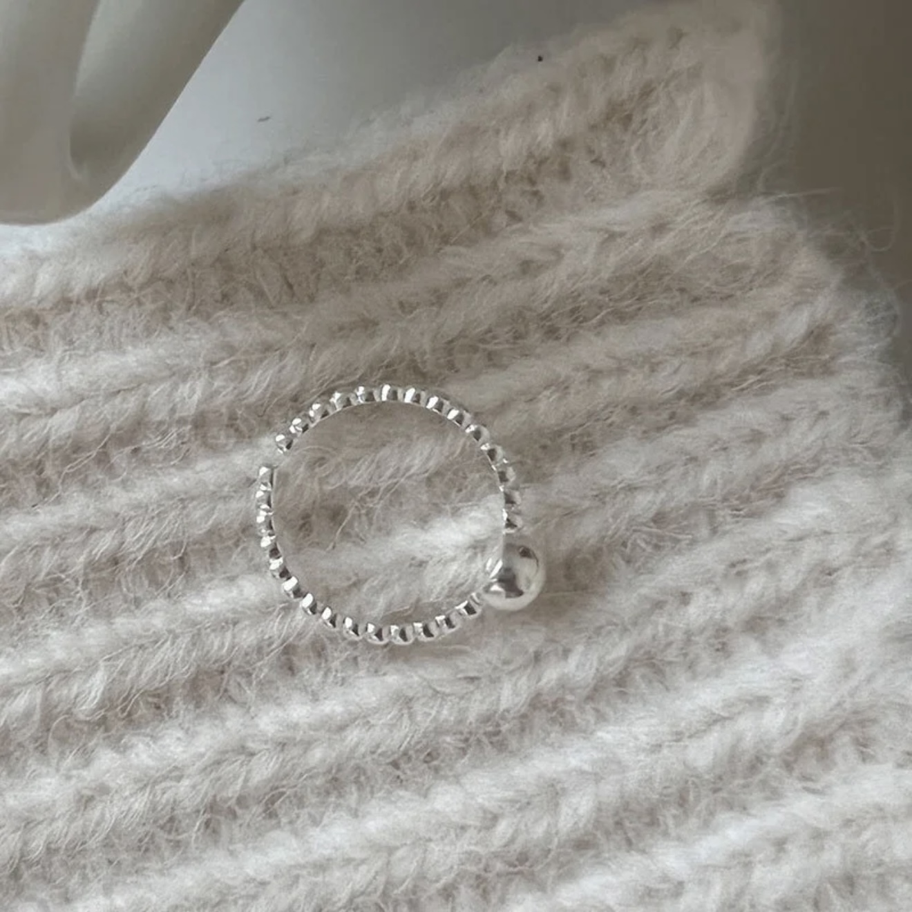 Bean shaped ring