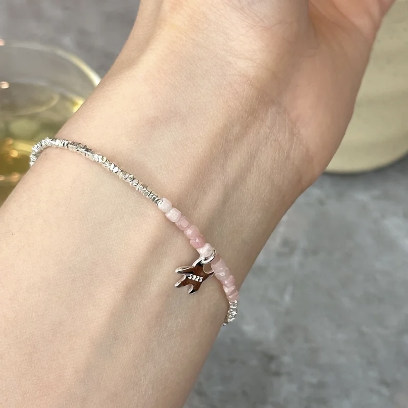 Silver star pink bracelet